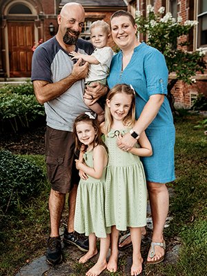 Breast cancer survivor Janelynn Deprey of West Gardiner, with husband Justin and children.