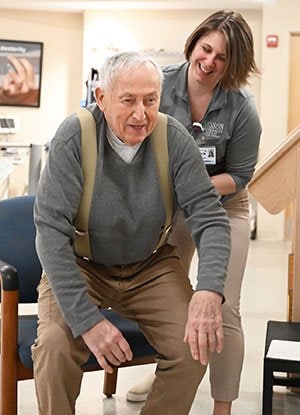 A MaineGeneral physical therapist works with a patient at the Oakland, Maine clinic